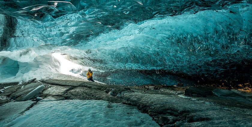 An image of the Mendenhall Ice Caves, a tourist attraction near Alaska.