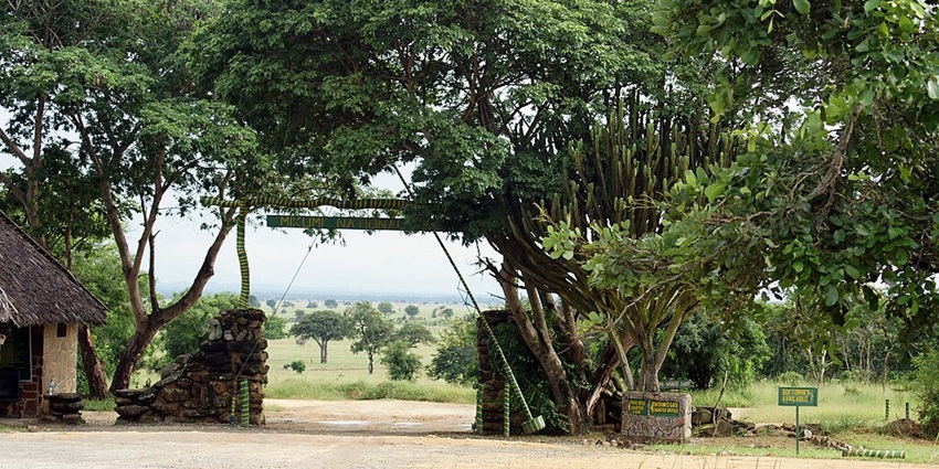 Entrance to Mikumi National Park, near Selous National Park Tanzania with a small hut.