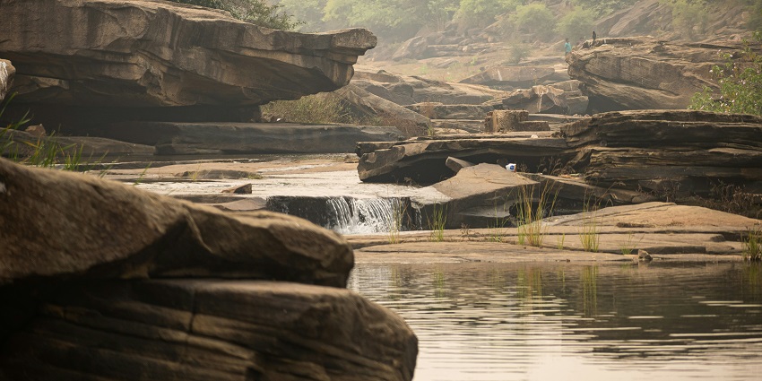 Lakhaniya dari waterfalls falling through the rocky terrains, a tourist place near Allahabad.