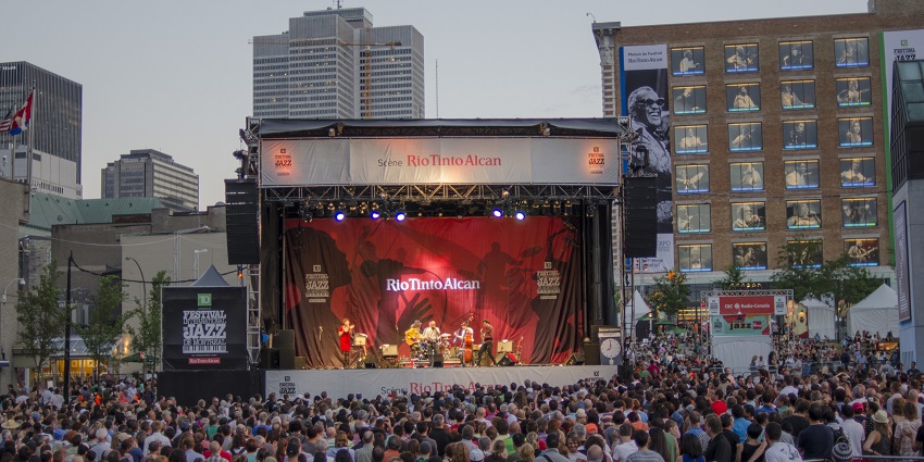 A vibrant performance at the Quebec Music Festival, showcasing live jazz musicians.
