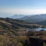 Mount Abu travel guide highlights Rajasthan's serene hill station with lush landscapes.