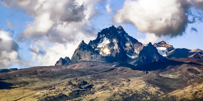 Three of the Mount Kenya peaks visible from Nyeri town and half-covered in snow.
