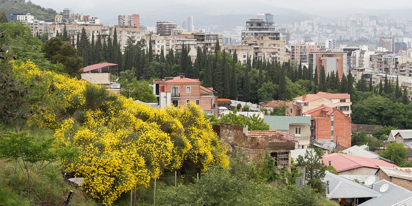 Hilltop destination offering panoramic views and amusement park fun, featured in the Tbilisi travel guide