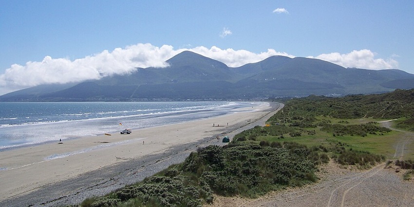 An image of Murlough Beach in County Down, Northern Ireland, with its sandy shore and scenic views