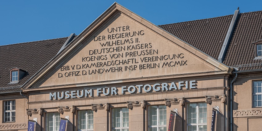 Close-up of Museum für Fotografie with names written on the top of the building