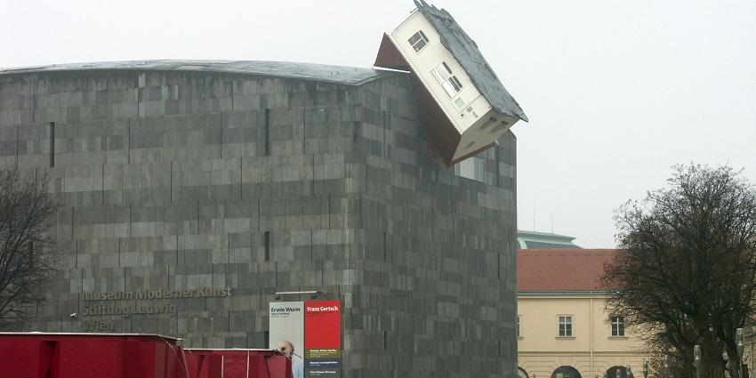 An image of the MUMOK building showcasing art exhibits and installations.