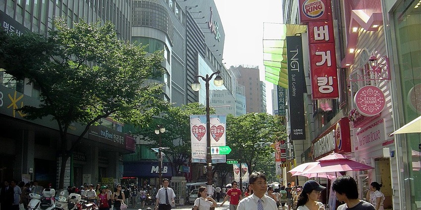 Vibrant Myeongdong street for shopping, street food, and entertainment.