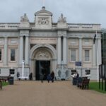 An image showing the front view of the National Maritime Museum in Greenwich, London