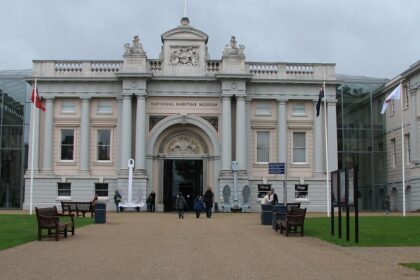 An image showing the front view of the National Maritime Museum in Greenwich, London