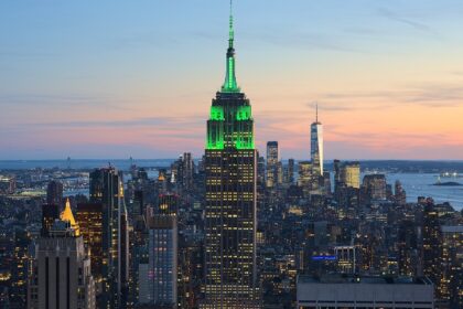 View of the Empire State Building in New York City from the Top of the Rock at 30 Rockefeller Plaza during sunset.