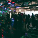 Group of people dancing and enjoying themselves at a nightclub enjoying nightlife in Canada.