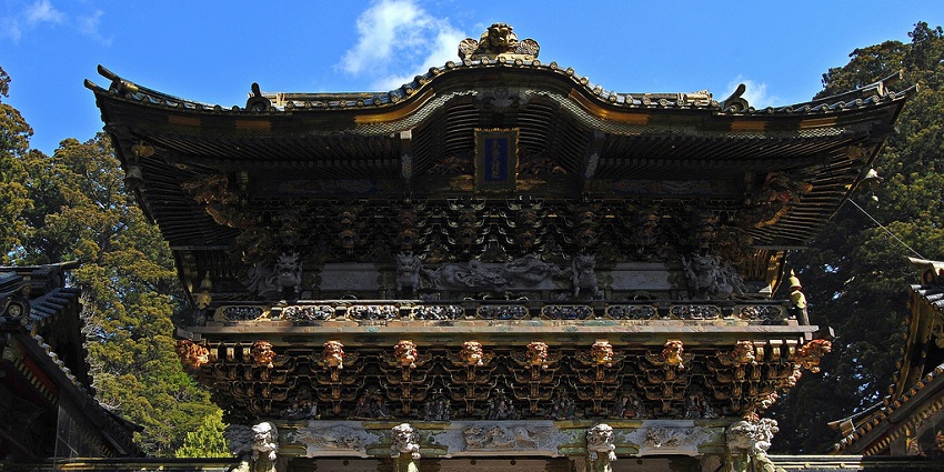 Toshogu Shrine in Nikko surrounded by autumn foliage is among places to visit in Japan in October.