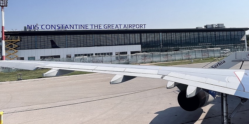 This image shows the wings of an aeroplane, which is at one of the best airports in Serbia.