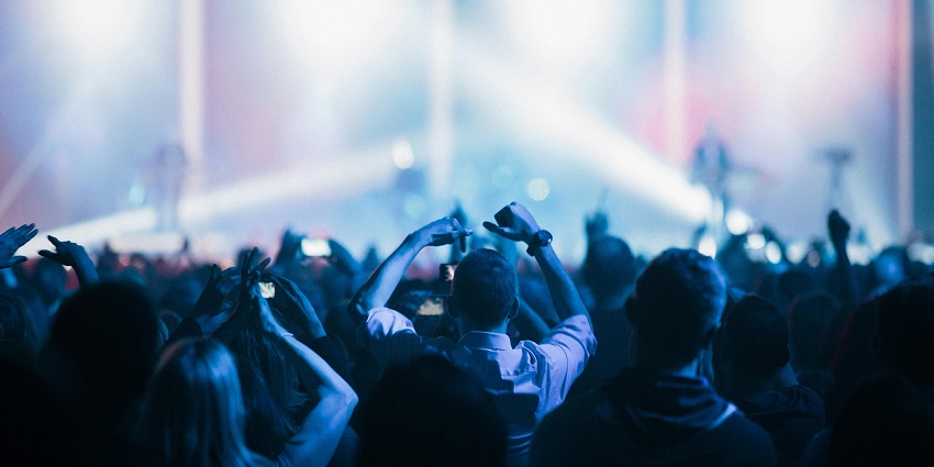 An image of concertgoers enjoying an indie band at the Noise Pop Festival in San Francisco.