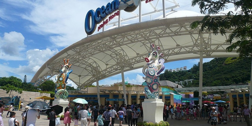 Entrance of Marine-themed park featuring animal exhibits, rides, and shows