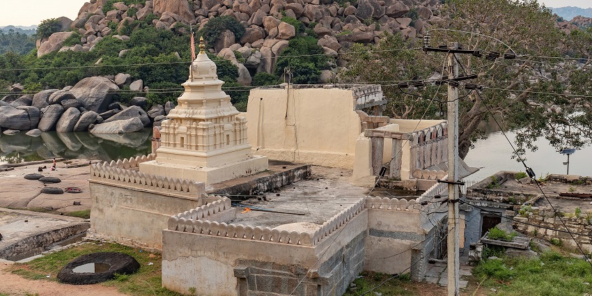 An image of Bade Hanuman Ji Temple with Hanuman Ji inside the temple.