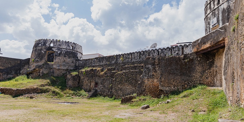 Ngome kongwe old fort with the old ruined architecture partially covered in grass