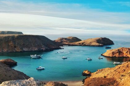 A view of Oman beaches feature crystal-clear waters and vibrant coastal experiences.