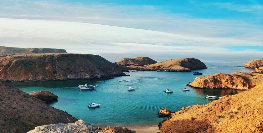 A view of Oman beaches feature crystal-clear waters and vibrant coastal experiences.