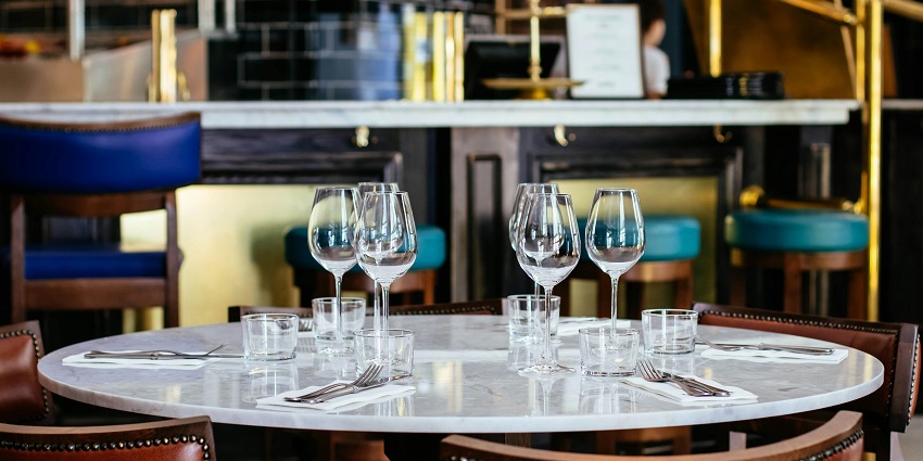 Image of photo of Different Empty Glasses on Table with beautifully decorated