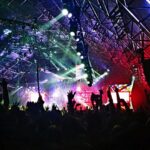 An image of the crowd gathered in front of the main stage at the Osheaga Music Festival.