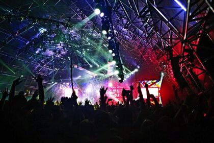 An image of the crowd gathered in front of the main stage at the Osheaga Music Festival.