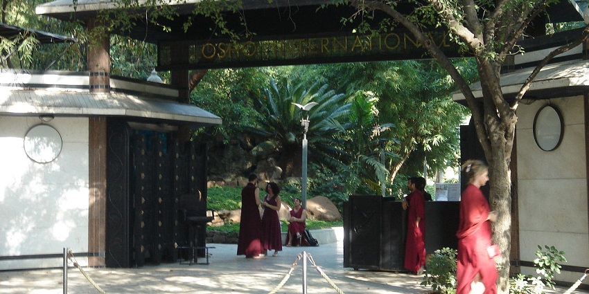 Image of Osho Ashram in between the lush greenery which is very serene