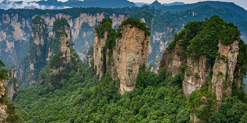 Image of Zhangjiajie National Forest Park with lush greenery covered rocks