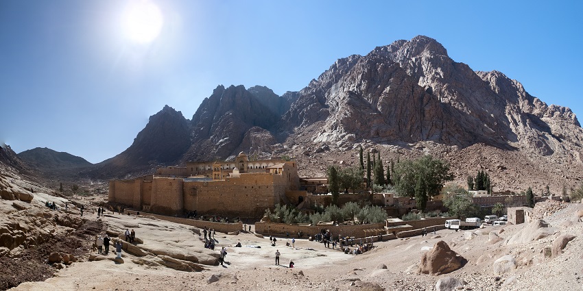 During the daytime, a distant view of the monastery where tourists are visiting