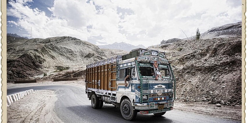A picture of a truck travelling on the roads of Kalachakra Monastery.