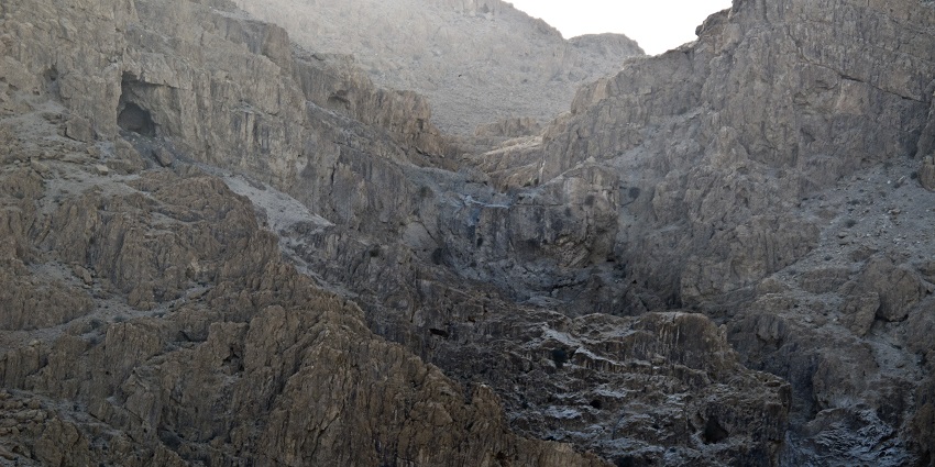 When visiting the Qumran Caves in Israel, carry plenty of water to stay hydrated.