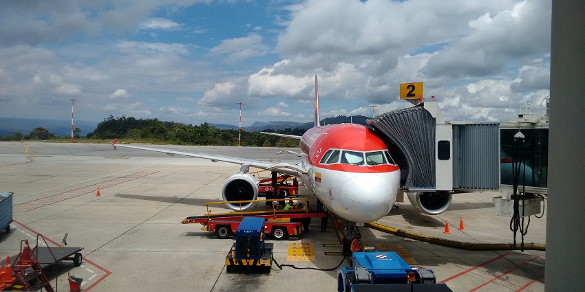 The runway of Palonegro International is surrounded by a picturesque view.