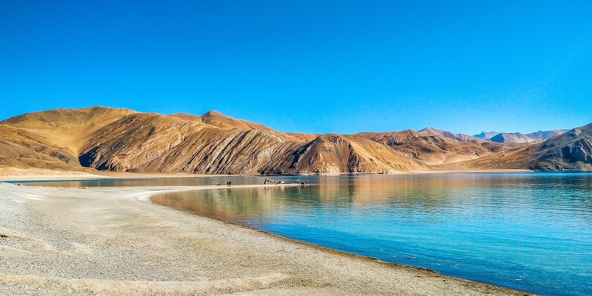 Stunning high-altitude lake with changing hues, as highlighted in the Leh Ladakh travel guide.