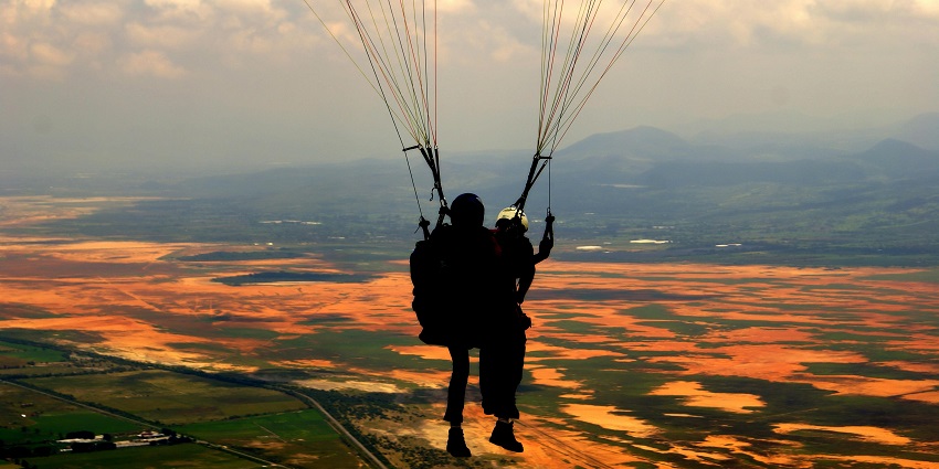 A trainer with a participant at Sohna, a top site for paragliding in Gurgaon