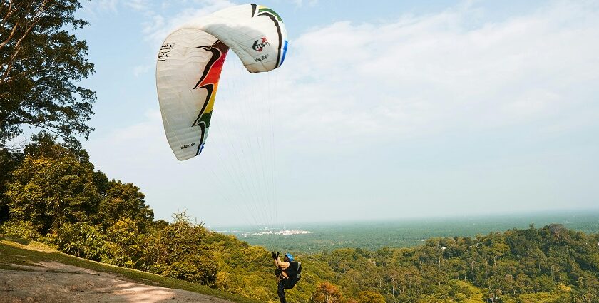 A man performing paragliding at a site in Sohna, a spot for paragliding in Gurgaon