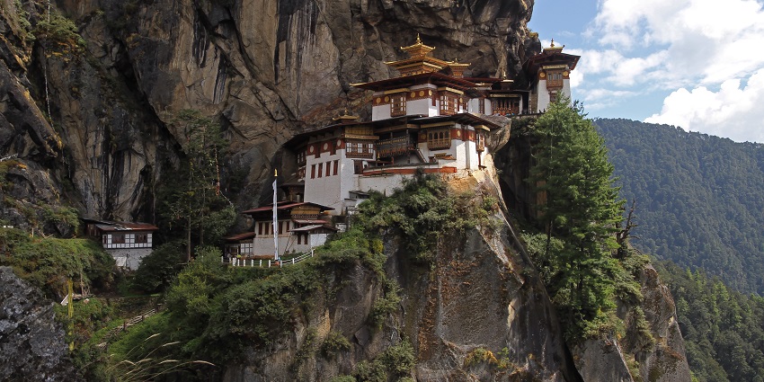 Breathtaking view of the Paro Taktsang perched atop the edge of a cliff in Paro District, Bhutan