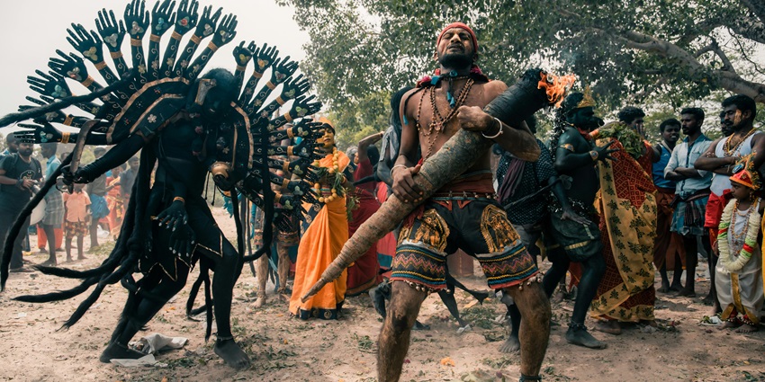 An image of a group of dancers performing the energetic Kolli Kuthu during Pongal.