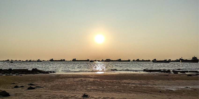 A tranquil sunset view of a beach, which is one of the best places to visit in Bangladesh