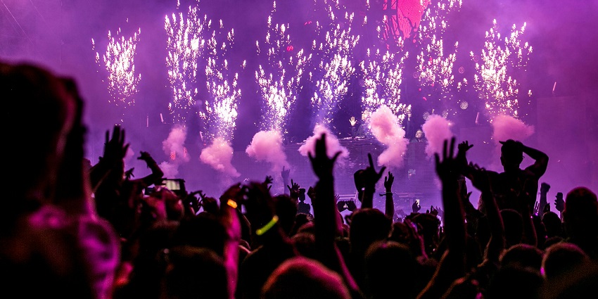 A view of Cosmopolitan pool parties featuring DJ's performance with pool view