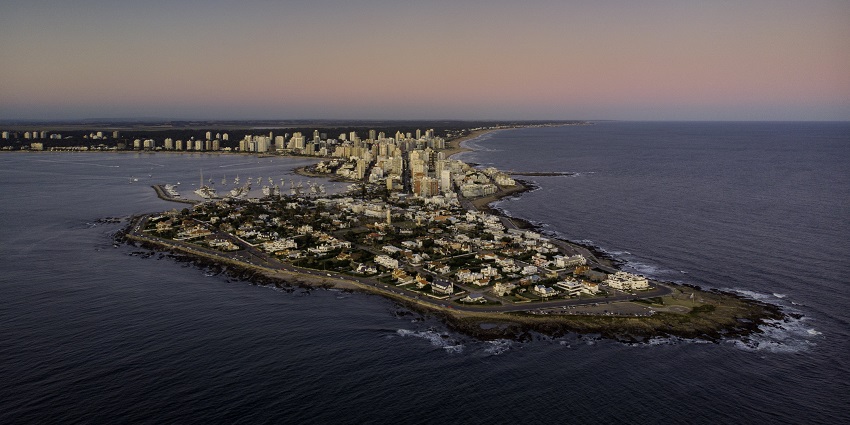 Beaches, luxury resorts, nightlife, and iconic La Mano sculpture, featured in Uruguay travel guide