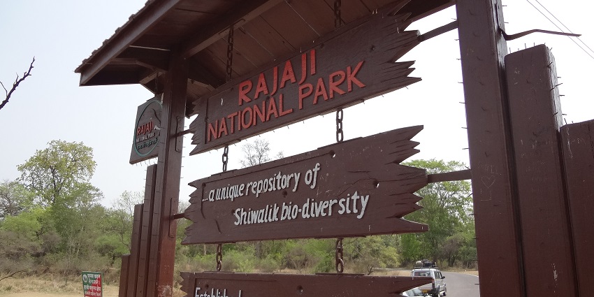 The entrance of the famous Wildlife sanctuary that features lush forests and diverse animal species.
