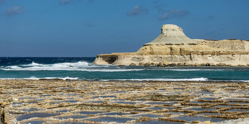 Blue Lagoon, alongside natural landforms made of stone are looking serene in sunlight.