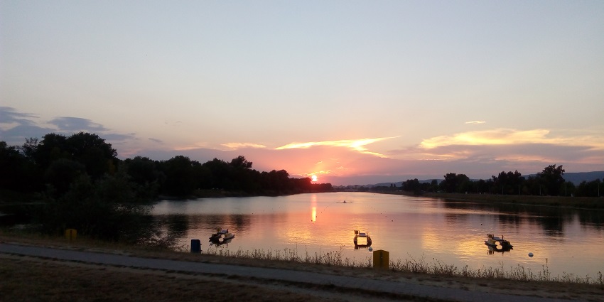 A sunset view of Jarun Lake, relaxing here is one of the best things to do in Zagreb.
