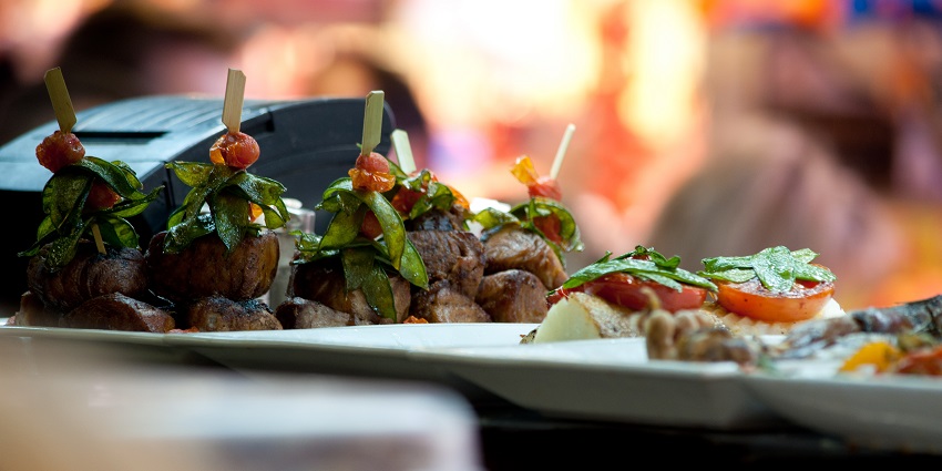Savor traditional Arabian dishes at night, offering a cultural culinary experience