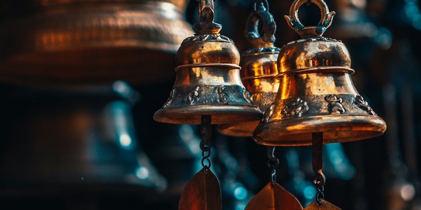 Image of a gold bell hanging at the Rigpa Ireland in Athlone, County Westmeath, Ireland.