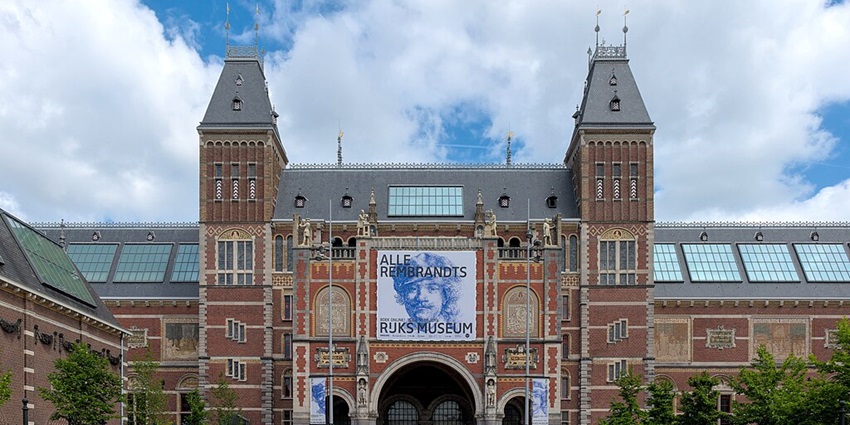 Visit the Rijksmuseum, a top tourist place to visit in Amsterdam.