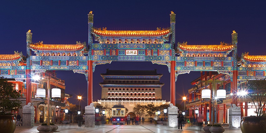 Stunning night view of Qianmen SOHO China with vibrant colours and traditional architecture