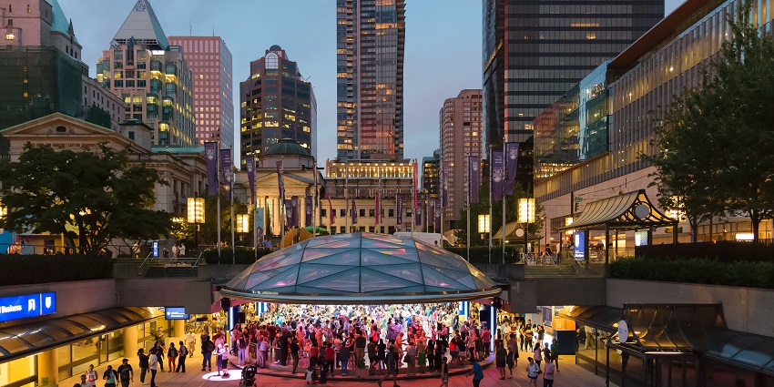 A picture of Robson Square from the viewpoint of downtown streets in Vancouver.