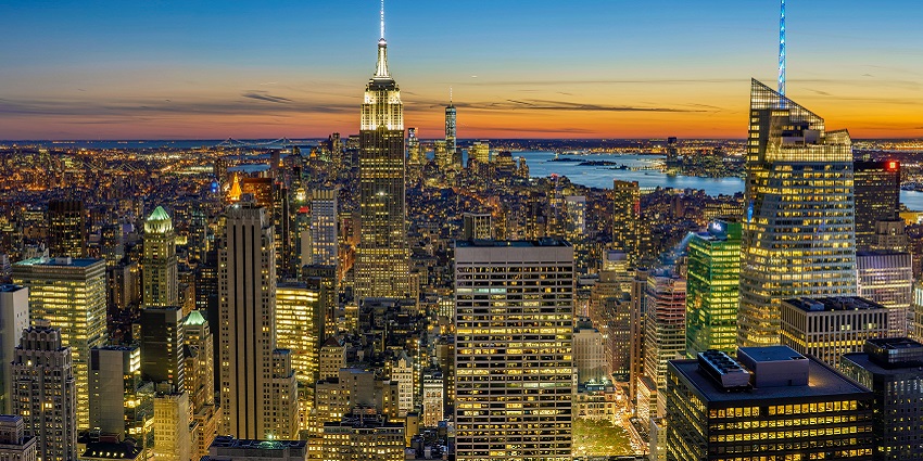 An image of Rockefeller Center glowing at sunset, one of the best spots to celebrate valentines day in New York.
