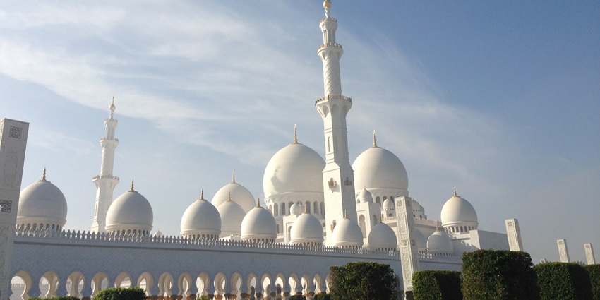 Mosque representing traditional Islamic architecture with decorated arches and geometry.